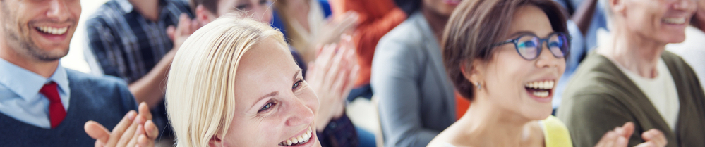 Audience_multicultural_smiling_clapping